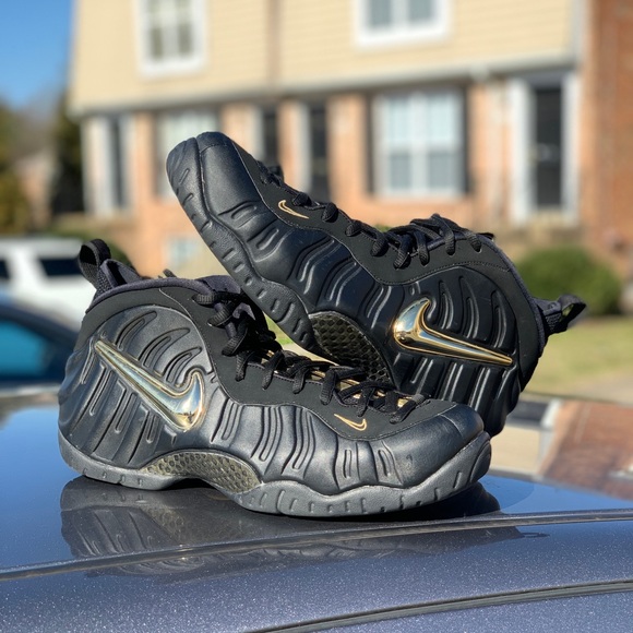 nike foamposite black metallic gold